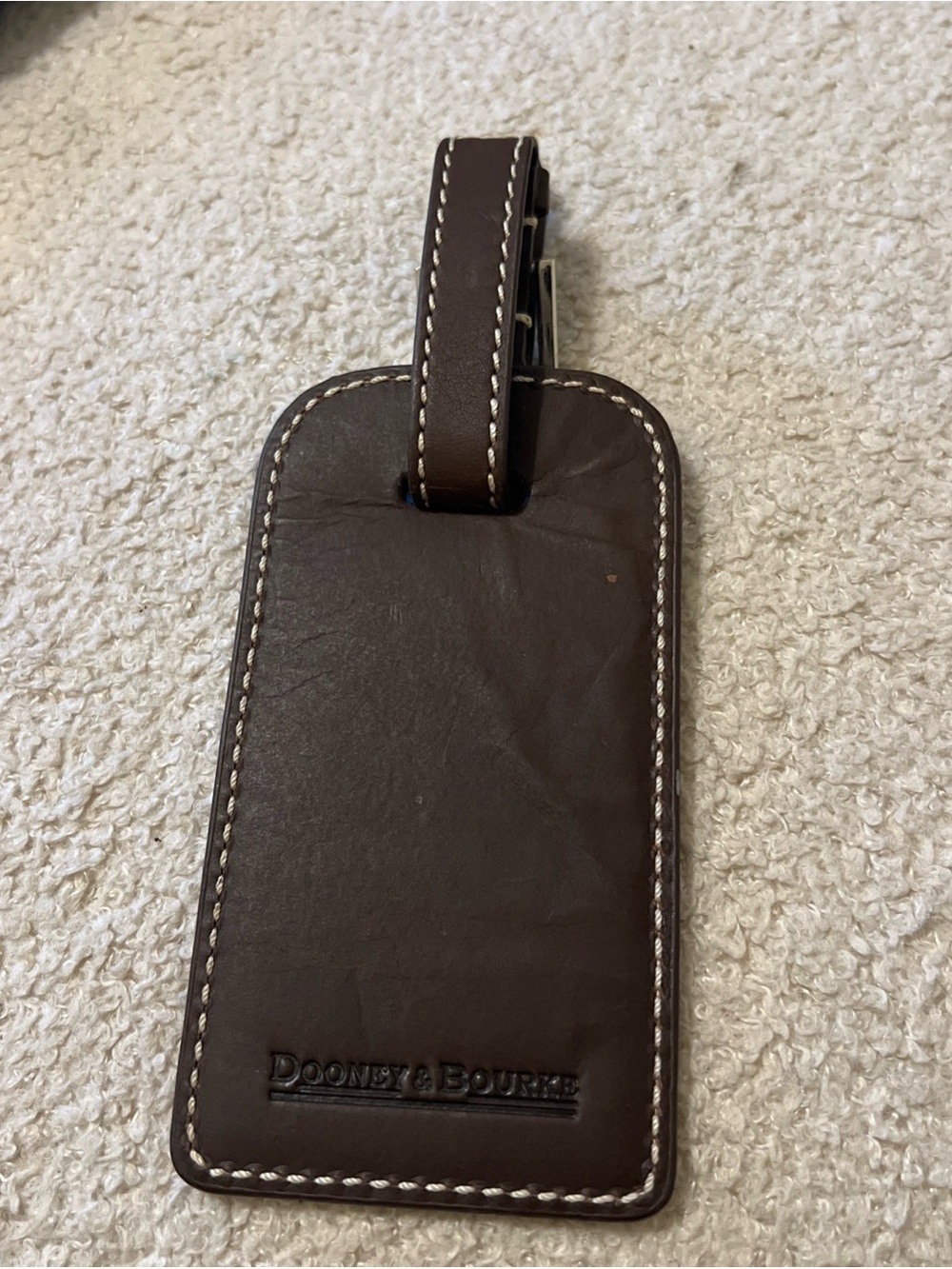 Dooney & Bourke luggage tag